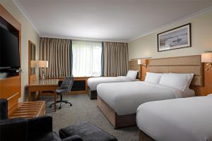 Uma cama ou camas num quarto em Radisson BLU Hotel and Spa, Limerick