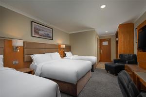Uma cama ou camas num quarto em Radisson BLU Hotel and Spa, Limerick