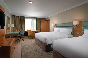 Uma cama ou camas num quarto em Radisson BLU Hotel and Spa, Limerick