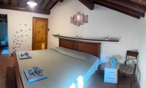 Postel nebo postele na pokoji v ubytování La Mora Affittacamere