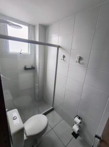 Et badeværelse på Residencial Prainha - apto 201