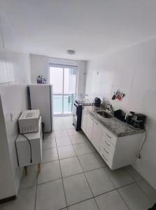 Køkken eller tekøkken på Residencial Prainha - apto 201 + 5 billeder