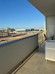 a balcony with a view of the airport at Bari San Francesco Mare in Bari