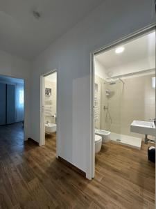 a bathroom with two toilets and a sink and a shower at Bari San Francesco Mare in Bari +31 photos