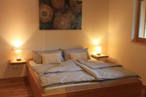 Postel nebo postele na pokoji v ubytování Ferienwohnung Waldzeit