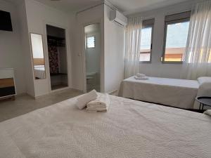 Postel nebo postele na pokoji v ubytování VMC Rooms