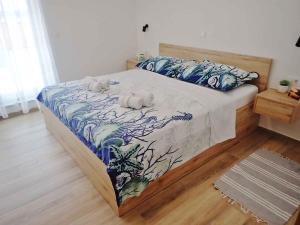 Postel nebo postele na pokoji v ubytování Apartment in Maslenica - Paklenica Riviera 46333 + 31 fotografií