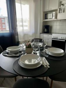 Η κουζίνα ή μικρή κουζίνα στο Cozy apartment near the city center with parking