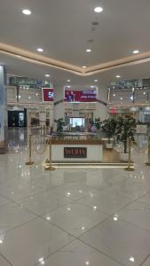 Ο χώρος του λόμπι ή της ρεσεψιόν στο Muscat Galaxy Hostel