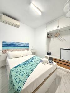Postel nebo postele na pokoji v ubytování Hostal RENCH