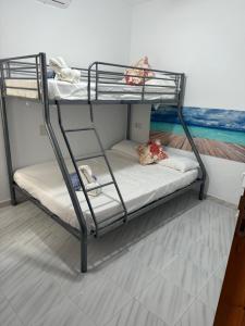 Postel nebo postele na pokoji v ubytování Hostal RENCH