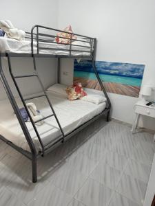 Postel nebo postele na pokoji v ubytování Hostal RENCH