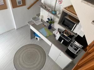 Kuchyň nebo kuchyňský kout v ubytování Hostal RENCH