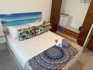 Postel nebo postele na pokoji v ubytování Hostal RENCH