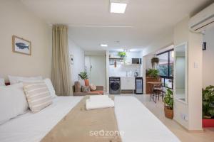 Ένα ή περισσότερα κρεβάτια σε δωμάτιο στο Studio Próximo ao Parque em Asa Norte - SCE114