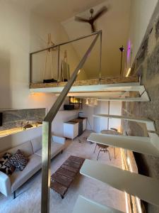 Katil atau katil-katil dalam bilik di Loft Duplex en Vigo