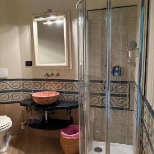 a bathroom with a shower and a sink and a toilet at Domus Luxury villa Alassio in Alassio