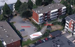 an overhead view of a building with a parking lot at Modern studio, good location, free parking in Kuopio +1 photo