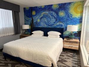 Voodi või voodid majutusasutuse Lighthouse Suites toas