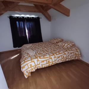 a bedroom with a bed and a window at Ciotat t3 piscine in La Ciotat