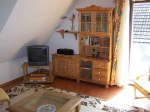 Televisyen dan/atau pusat hiburan di Inselspecht OG Comfortable holiday residence