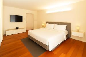Katil atau katil-katil dalam bilik di Giax Tower-Spa, Pool, Parking