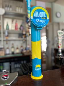 a blue and yellow pole sitting on top of a table at Cutter Hotel in Weymouth +14 photos