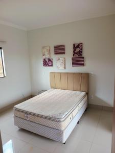 Katil atau katil-katil dalam bilik di Chacara Mataragia +9 gambar