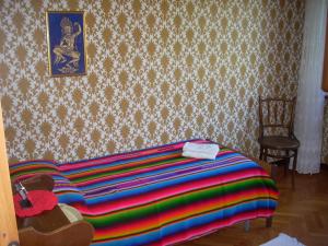 Postel nebo postele na pokoji v ubytování Bed and Breakfast Al Laghetto + 5 fotografií