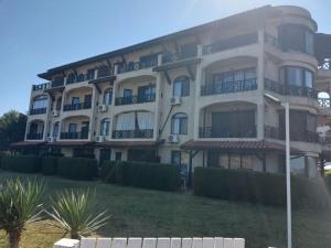 a large building with balconies on the side of it at Lozenets Oasis Beach Home Lila in Lozenets