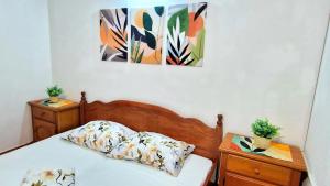 Ein Bett oder Betten in einem Zimmer der Unterkunft Villa Dusper