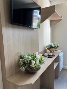 TV a/nebo společenská místnost v ubytování Summit Naturescer Eco Hotel