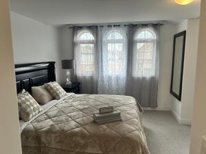 A bed or beds in a room at The Angus Nest