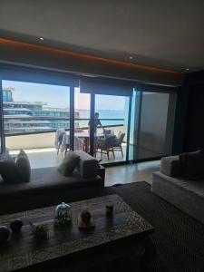 Posezení v ubytování Penthouse Bucerías con acceso a playa + 37 fotografií