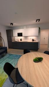 Nhà bếp/bếp nhỏ tại Bike & Ski MOSS Apartment