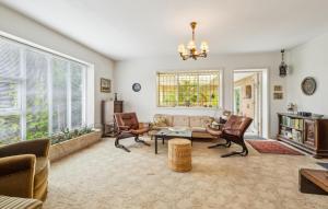 a living room with a couch and chairs and a table at 3 Bedroom Lovely Home In Nykøbing M in Nykøbing Mors