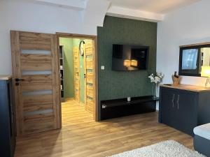 A kitchen or kitchenette at Péterfia Boutique Apartments