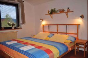 Posteľ alebo postele v izbe v ubytovaní Apartment Harrachov - Riesengebirge 2400