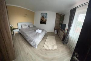 Postel nebo postele na pokoji v ubytování Casa de pe deal Sighisoara