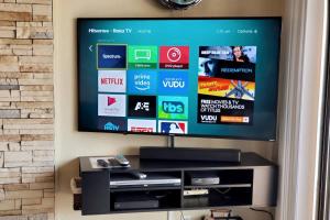 a flat screen tv hanging on a wall at WOW Location Incredible Views in Osage Beach