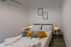 Ένα ή περισσότερα κρεβάτια σε δωμάτιο στο Aromarìa Palace