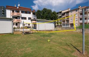 a soccer ball in a field with a net at Awesome Home In Pula With Sauna in Pula