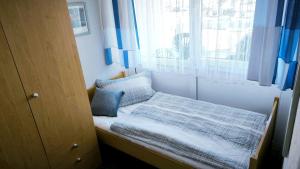 Ένα ή περισσότερα κρεβάτια σε δωμάτιο στο Frische-Brise-01-09 +2 φωτογραφίες