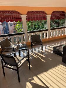 Posezení v ubytování Cozy house in San Pedro