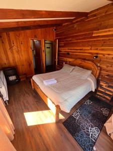 Postelja oz. postelje v sobi nastanitve Hostal Chumay