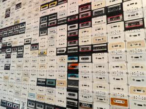 a wall full of electronic devices on display at Hostel Fish Seattle in Seattle