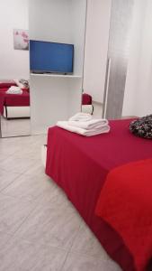 Postel nebo postele na pokoji v ubytování Sweet Home Rosa