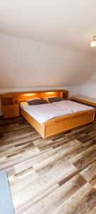 Postel nebo postele na pokoji v ubytování Ferienwohnung am Bach + 17 fotografií