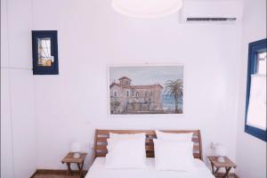 Кровать или кровати в номере - Kioupi - 2 bedroom elegant and stylish house