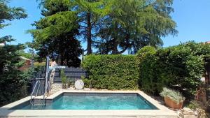 Bazén v ubytovaní Villa Lido 145 m2 with pool alebo v jeho blízkosti